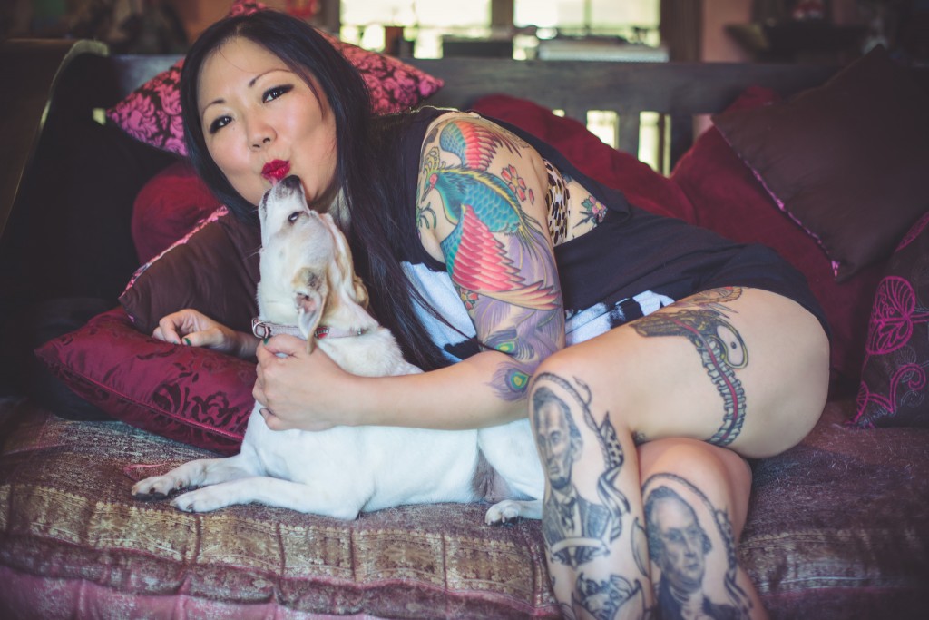 Stand-up comedian Margaret Cho with her dog. Photo by Mary Taylor. 