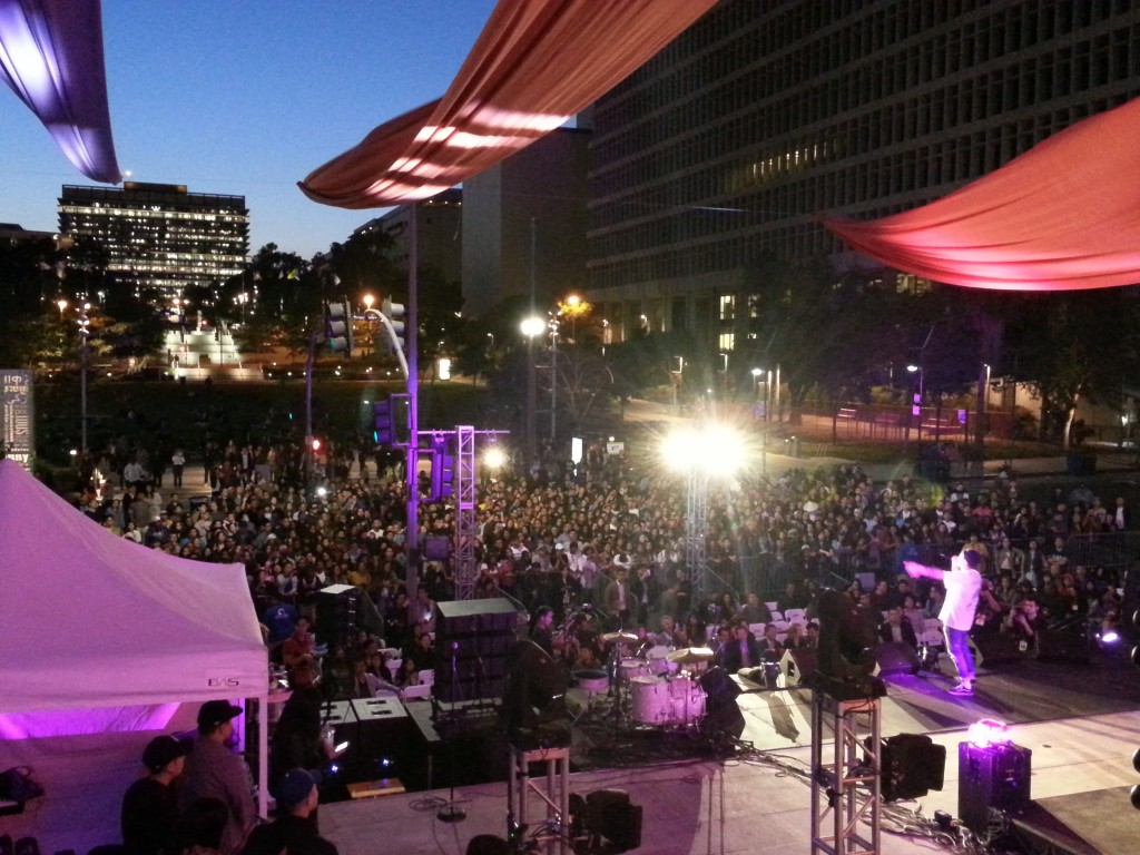 Dumbfoundead in front of a diverse crowd on Spring Street in front of City Hall. Photo by May Zeng