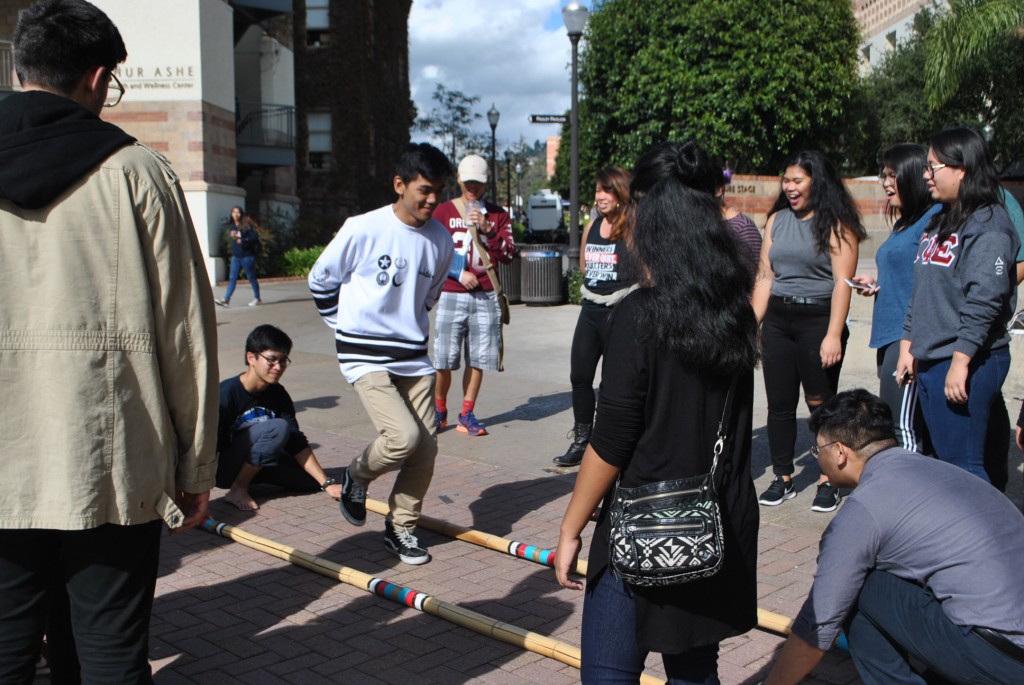 As the crowd grew bigger, more people joined in and learned to dance. 